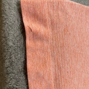 Lululemon Swiftly Tech Long Sleeve 2.0. Color is a peachy color.